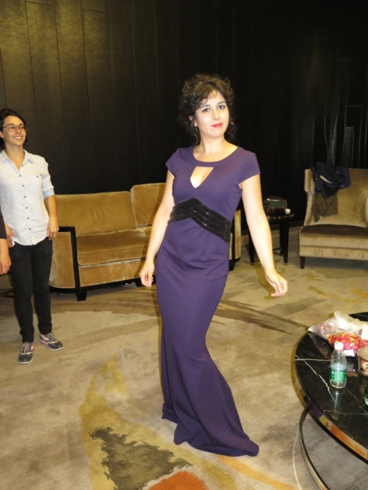 Laura is on tour in China and had to 'pretend' her suitcase was lost to explain her lack of 'gowns' to the Chinese organisers. They promptly found her suitable replacements. Here she is modelling one of them. 