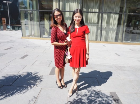 Mother and daughter rocking different reds. 