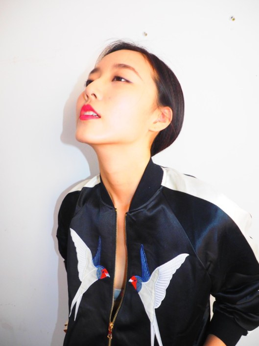 DuYang in a Stella McCartney bomber jacket.